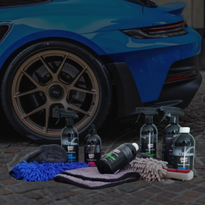 car-care-products-infront-of-porsche